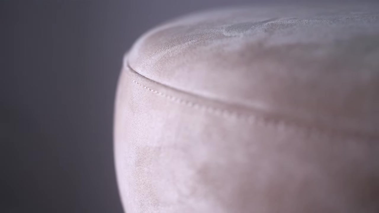 Detail of the pouffe upholstery